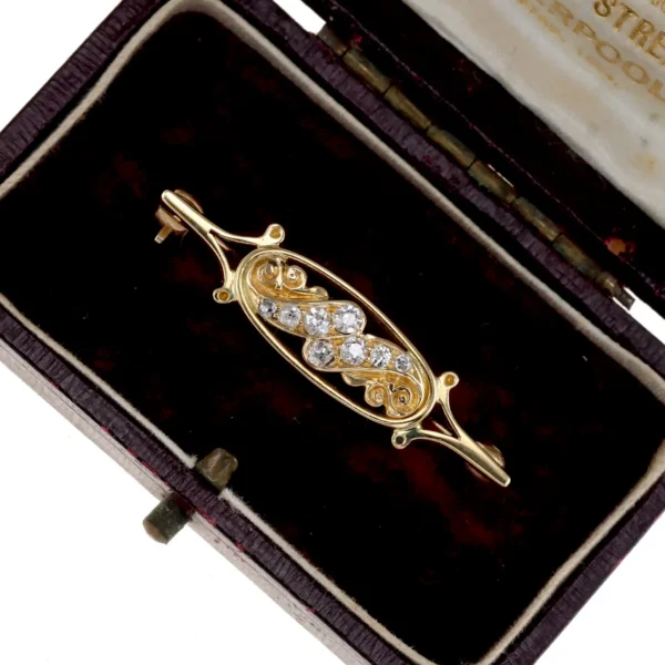 Mała broszka z diamentami - 18K