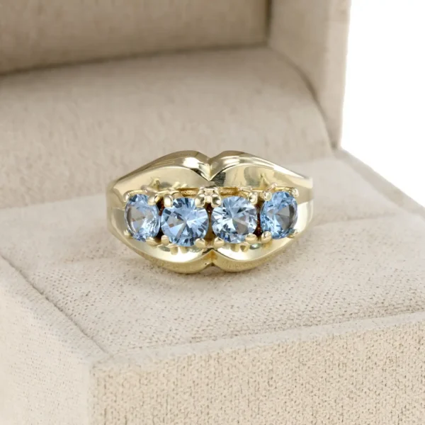 Złoty pierścionek z syntetycznymi spinelami - 14K