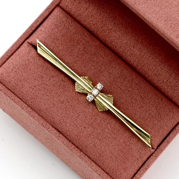 Brosza trzy brylanty - 14K